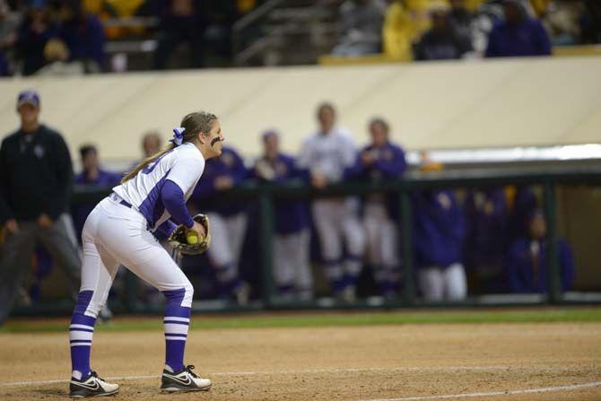 Sophomore pitcher/utility, Baylee Corbello (19) pitches on Friday during the tigers' softball game against Ball State on Friday Feb. 27, 2015 at Tiger Park.