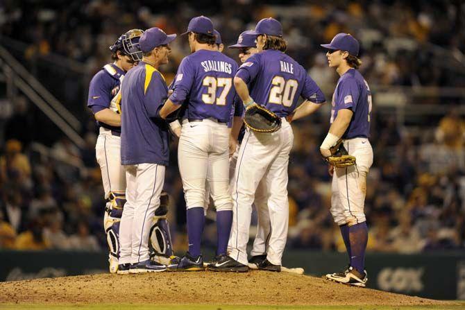 Team huddle on pitchers mound, during the Tigers&#8217; 5-3 defeat against Ole Miss on Saturday, March. 14, 2015.