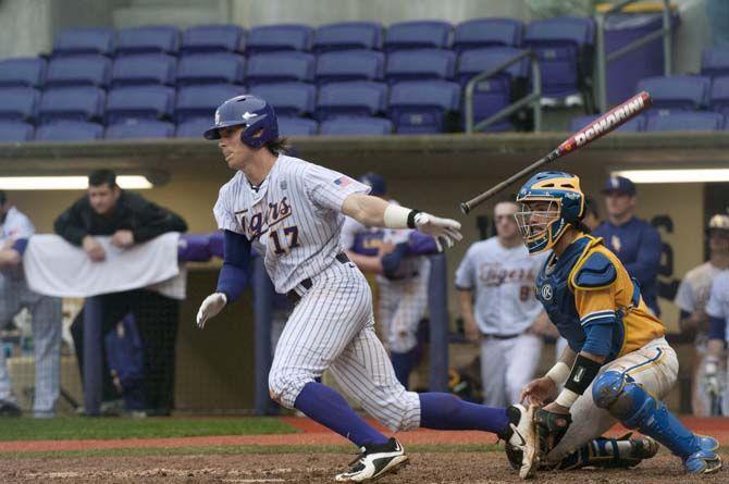 LSU senior outfielder Jared Foster (9) hits the ball Wednesday Mar. 11, 2015 in the Alex Box Stadium.