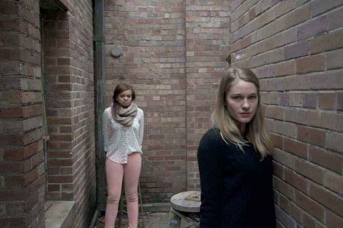 LSU sophomore finance major Kelsey Anderson and LSU freshman french, film and media arts major Jane Ledford stand outside the Studio Arts Building on Tuesday, Feb. 03, 2015. They model outside of school.