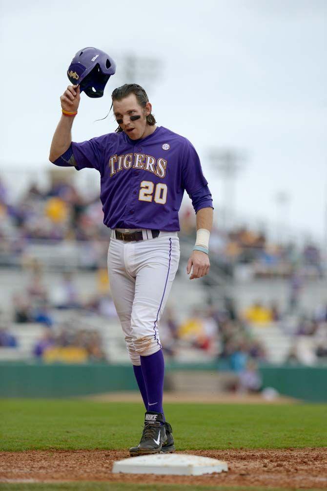 LSU senior infield Conner Hale (20) removes his helmet after getting out during the Tigers&#8217; 16-2 victory against Boston College on Saturday, Feb. 21, 2015 in Alex Box Stadium.