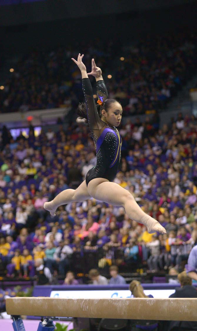 LSU freshman all-around Erin Macadaeg does her rutine on the beam during the Tiger's 198.375 - 195.450 victory against Minnesota on Friday, March 6, 2015, at the Pete Maravich Assembly Center.