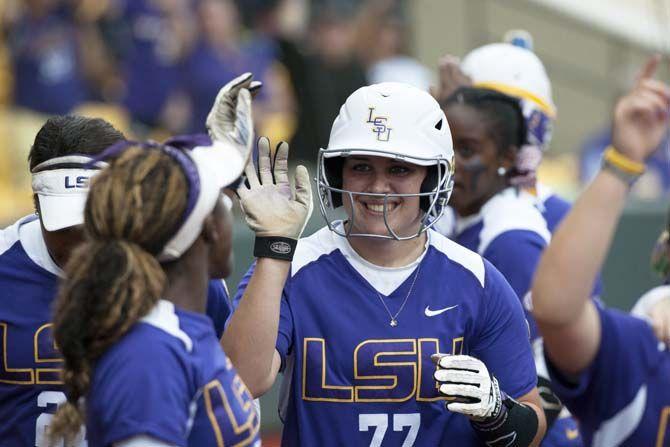 LSU junior catcher Kellsi Kloss (77) celebrates after a homerun during the Tigers' 10-2 victory against Oklahoma Saturday, March 21, 2015 in Tiger Park.