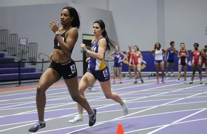 LSU distance junior Andria Aguilar runs Friday, Jan. 9, 2015 during the Tigers track and field meet inside the Carl Maddox Field House.