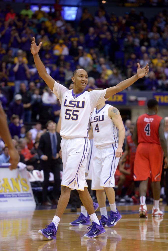 LSU sophomore guard Tim Quarterman (55) celebrates a play Saturday, Feb. 28, 2015 during the Tigers' 73-63 victory against Ole Miss in the Pete Maravich Assembly Center.