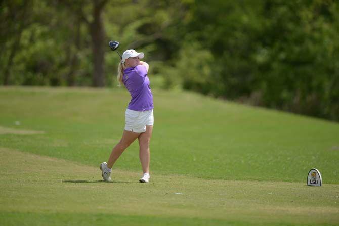 LSU freshman Elise Bradley hits the ball during the lady tiger's victory at the University Club on sunday March 29, 2015 during the Tiger Classic.