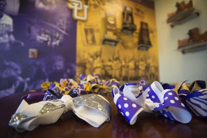 LSU softball players use diverse type of bows to enchance their looks while they play, following the look good, feel good, play good philosophy. Bows are displayed on Tuesday, Feb.10, 2015 inside the main office at Tiger Park.