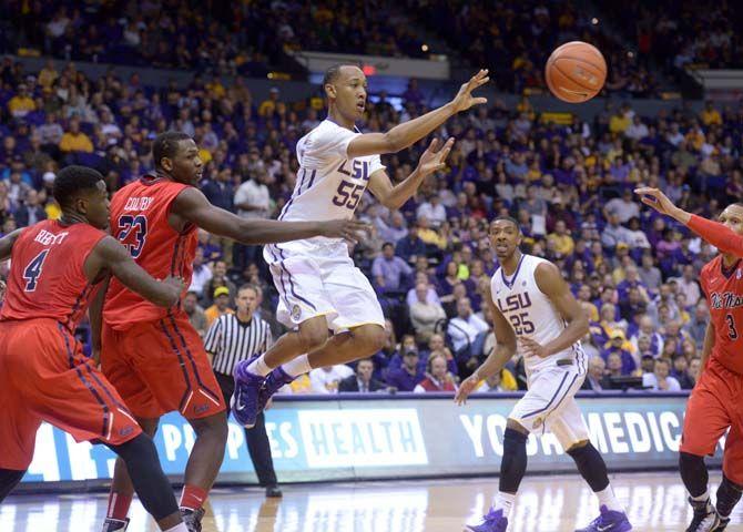 LSU sophomore guard Tim Quarterman (55) passes the ball Saturday, Feb. 28, 2015 during the Tigers' 73-63 victory against Ole Miss in the Pete Maravich Assembly Center.