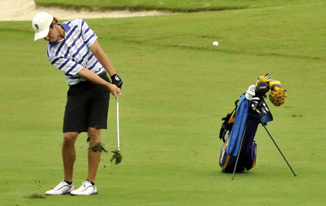 Freshman Eric Ricard takes a shot Saturday, October 5, 2013 at the fifth-annual David Toms Intercollegiate at the University Club.