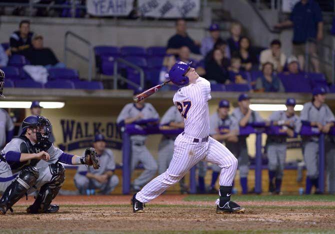 LSU sophomore infielder Danny Zardon (27) looks at the ball after a hit Tuesday, Mar. 3, 2015 in the Alex Box Stadium.