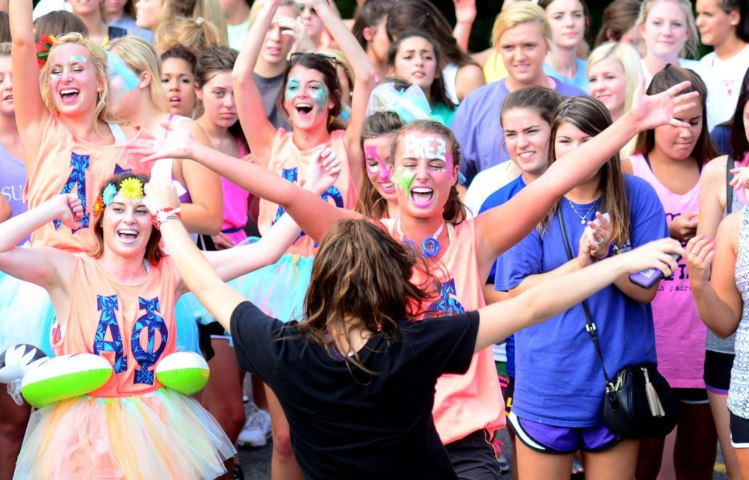 Alpha Phi sorority meets new potential new member on bid day August 23, 2014.