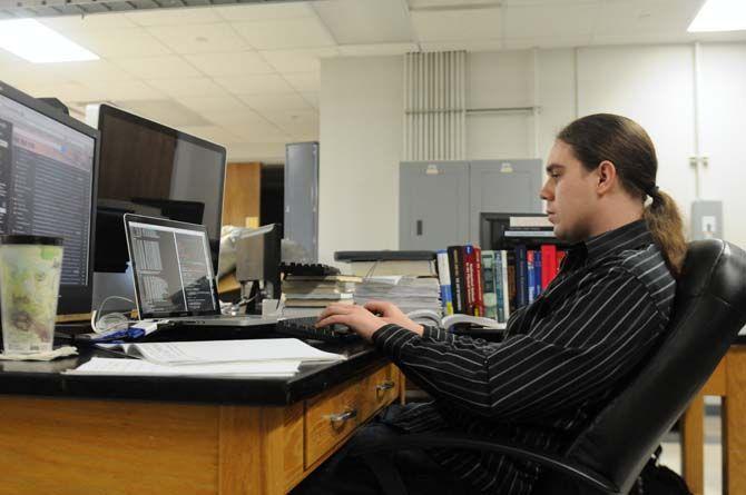 LSU physics Ph.D candidate Nick Cannady researches in the lab on March 10, 2014, for an international project to develop an instrument which will study cosmic rays in space.