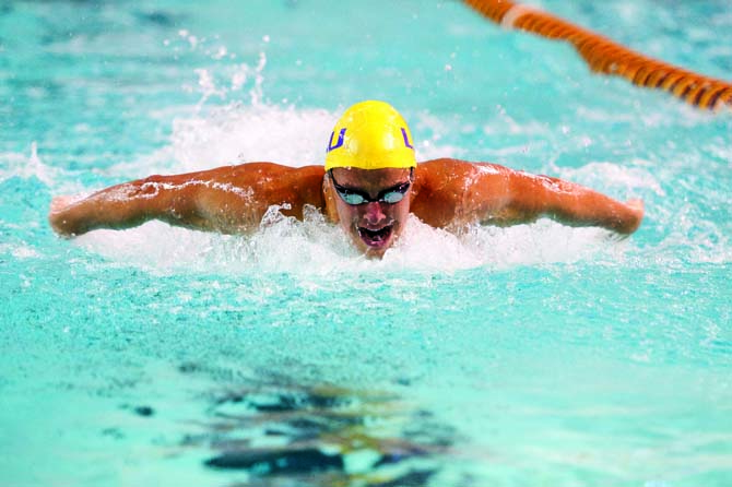 <p>LSU freshman Frank Greeff swims the men’s 200-yard butter y Jan. 21, 2012, at the LSU swimming and diving meet against Texas A&M.</p>