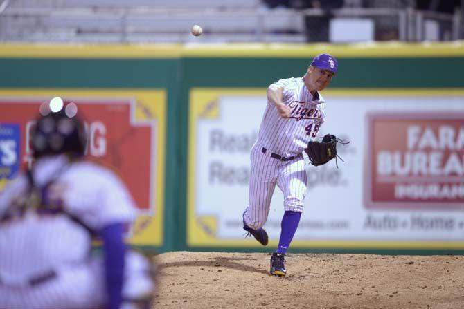 LSU sophomore Russel Reynolds (45) warms up during the Tigers' 9-8 victory against Southeastern on Thursday Feb. 26, 2015 in the Alex Box Stadium.