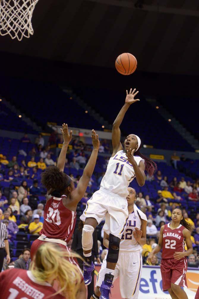 LSU sophomore guard, Raigyne Moncrief (11), shoots the ball during the Tigers' 51-39 victory against Alabama on Sunday, Feb. 8, 2015, in the Pete Maravich Assembly Center.