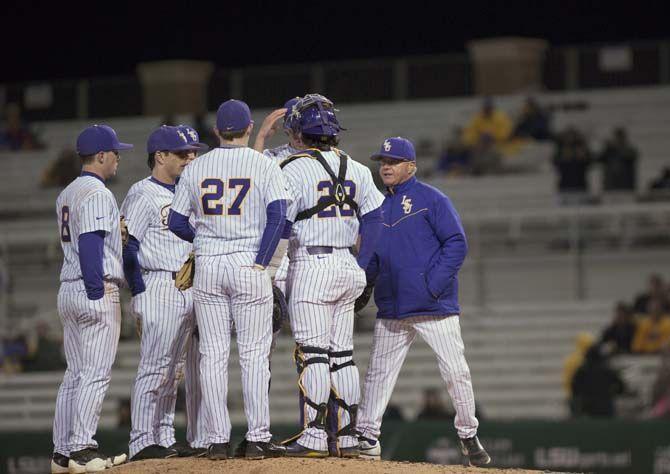 LSU head coach Paul Mainieri talks to his player during the Tigers' 9-8 victory over Southeastern on Thursday, Feb.26, 2015 in the Alex Box Staidum.