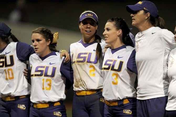 LSU sophomore infielder Sahvanna Jaquish (2) celebrates with her teammates by singing the LSU Alma Mater on Tuesday, March 24, 2015, during the Tigers' 8-0 win against South Alabama in Tiger Park.