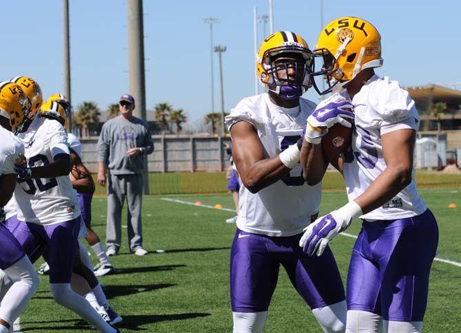 LSU sophomore WR John Diarse (9) and LSU junior WR Travin Dural (83) on Saturday, Mar. 07, 2015 during the first spring practice in the Football Operations practice field.