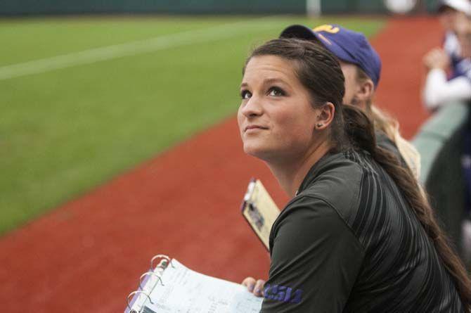 LSU student coach Tammy Wray stands in the dugout during the Tigers' 10-2 victory against Oklahoma Saturday, March 21, 2015 in Tiger Park.