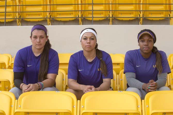 LSU junior catcher Kellsi Kloss (77), sophomore infielder Sahvanna Jaquish (2) and junior shortstop Bianka Bell (27) form the heart of the Tiger&#8217;s batting order.