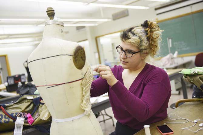 LSU apparel design senior Erica Gsell and other textiles and merchandising students prepare garments Tuesday, April 28, 2015 for the department&#8217;s ninth annual fashion show titled &#8220;Luminous&#8221;.