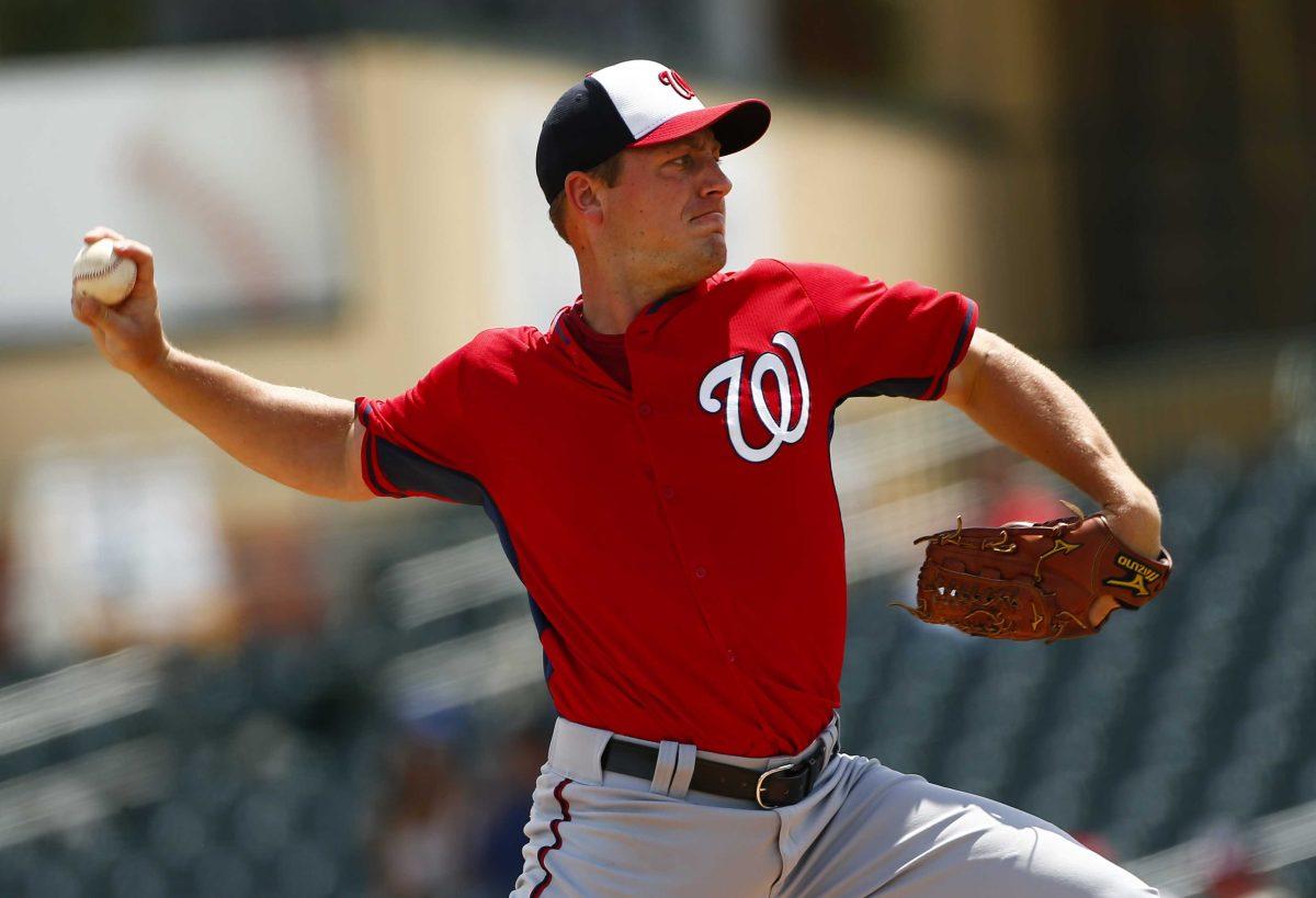 Washington Nationals starting pitcher Jordan Zimmermann (27) works in the first inning of an exhibition spring training baseball game against the Miami Marlins Wednesday, April 1, 2015, in Jupiter, Fla. (AP Photo/John Bazemore)