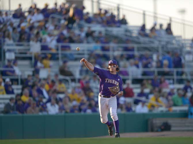 LSU senior infield Conner Hale (20) warms up before the Tigers' 7-3 victory against Kentucky on Saturday, March 28, 2015 in the Alex Box Stadium.