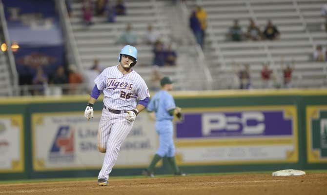 LSU junior catcher Chris Chinea (26) runs the bases Tuesday, April 21, 2015 during the Tigers' 6-0 victory against Tulane at Alex Box Stadium.