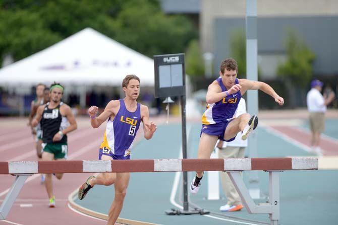 LSU sophomore Christian Jhonson and junior Philip Dempsey run the men 3000 meter steeplechase during the 2015 LSU Invitational Battle on the Bayou on Saturday, April 4, 2015, at the Bernie Moore Stadium.