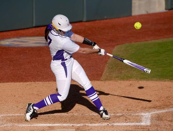 LSU junior catcher Kellsi Kloss (77) hits the ball on Saturday, Feb. 7, 2015 during the Tiger' 10-0 victory against Tennessee State in Tiger Park.