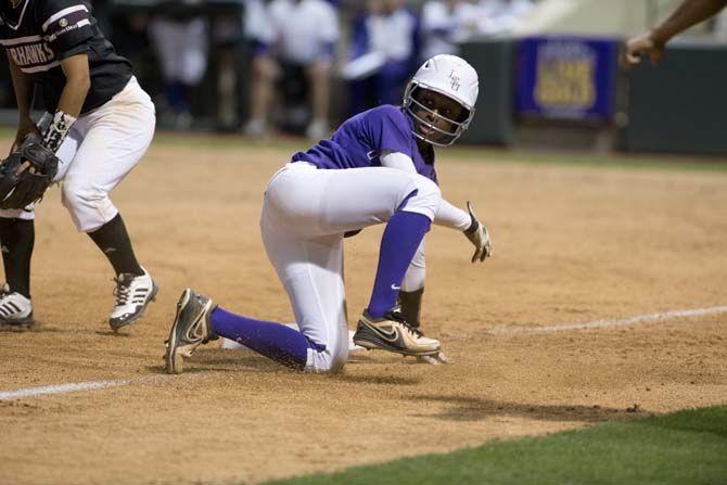 LSU senior outfielder A.J. Andrews (6) steals third base on March 31, 2015 during the Tigers' 7-3 victory against UL Monroe in Tiger Park.