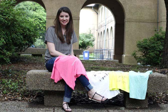 LSU junior textiles, apparel design and merchandising Peyton Simms poses with her designs on Sunday April 26, 2015.