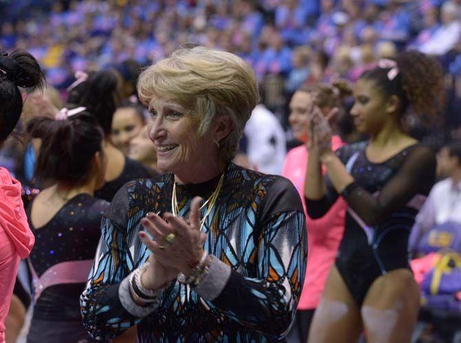 LSU gymnastics head coach D-D Breaux supports her team during the Tigers' 198.075-196.850 victory against No. 9 Georgia on Friday, Feb. 6, 2015. in the PMAC.