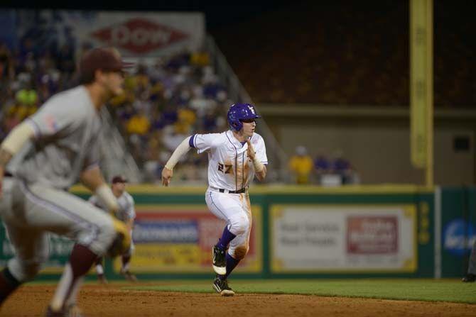 LSU sophomore infielder Danny Zardon (27) runs to third base on Thursday, April 23, 2015, during the Tigers' 4-3 win against the Aggie's in Alex Box Stadium.