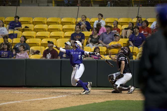 LSU sophomore infielder Constance Quinn (5) hits the ball on March 31, 2015 during the Tigers' 7-3 win against UL Monroe in Tiger Park.