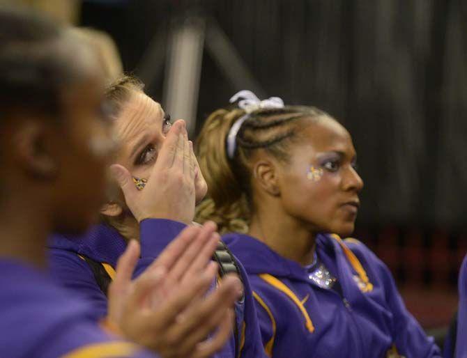 LSU sophomore all-around Sydnay Ewing wipes her tears after being disqualified for the final round of the 2015 NCAA gymnastics championships on Friday, April 17, 2015 in Fort Worth, Texas.