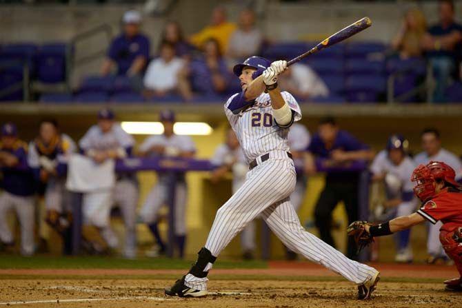 LSU senior infielder Connor Hale (20) slaps a double on Wednesday, April 15, 2015, during the Tigers' 11-2 win against Lamar in Alex Box Stadium.