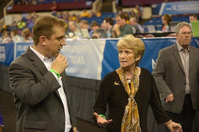 LSU gymnastics head coach D-D Breaux talks with associate head coach Jay Clark after a bad perfomance of the team on the beam during the 2015 NCAA gymnastics championships on Friday, April 17, 2015 in Fort Worth, Texas.