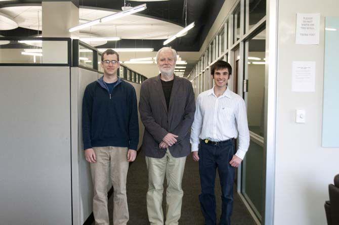 LSU mathematics junior Daniel Bourgeois, Professor Harmut Kaiser and STE||AR Group scientific program coordinator Adrian Serio look at new STORM software on Tuesday April 28, 2015, in the Digital Media Center.