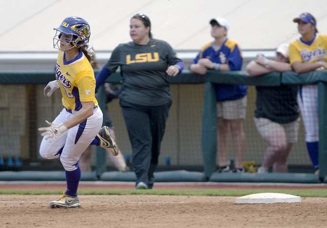 LSU sophomore outfielder Bailey Landry (26) rounds first base on Monday, April 20, 2015, during the Tigers' game against Texas A&amp;M at TIger Park.