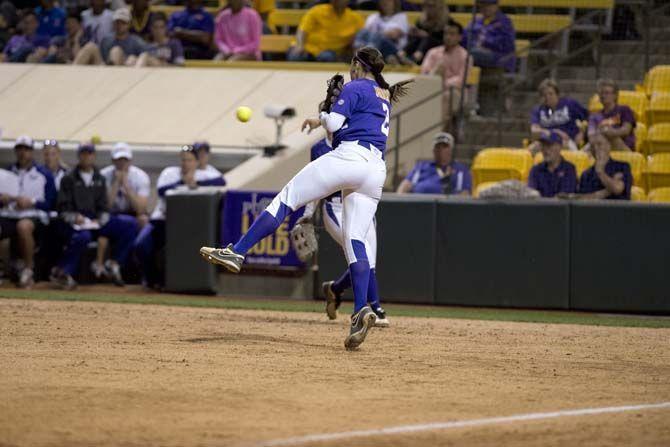 LSU sophomore infielder/catcher Sahvanna Jaquish (2) catches the ball and throws it to first on March 31, 2015 during the Tigers' 7-3 win against UL Monroe in Tiger Park.