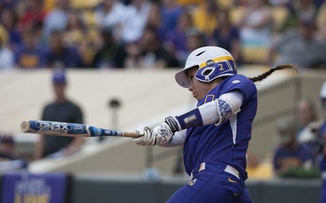 LSU sophomore catcher Sahvanna Jaquish (2) hits a homerun during the Tigers' 10-2 victory against Oklahoma Saturday, March 21, 2015 in Tiger Park.