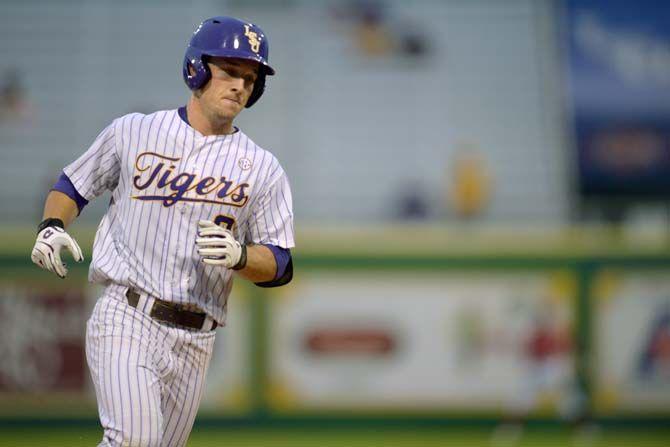 LSU junior infielder Alex Bregman (8) rounds third base on Wednesday, April 15, 2015, during the Tigers' 11-2 win against Lamar in Alex Box Stadium.