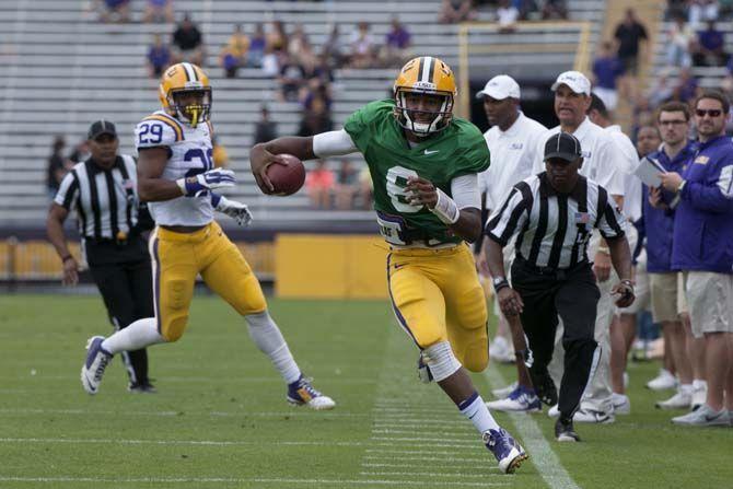 LSU sophomore quarterback Brandon Harris (6) runs the ball down the yard line during LSU white squad&#8217;s 45-6 victory over LSU purple squad on Saturday, April 18, 2015 during the annual Spring Football game in Tiger Stadium