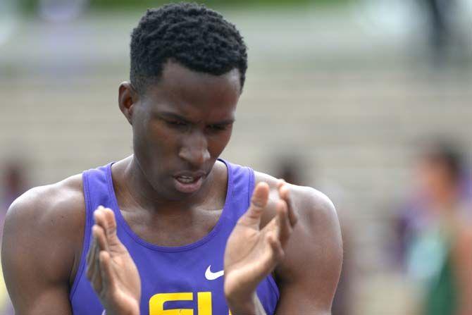 LSU junior Fitzroy Dunkley claps after finishing first with a time of 46.55 on the men Men 400 Meter Dash during the 2015 LSU Invitational Battle on the Bayou on Saturday, April 4, 2015, in the Bernie Moore Stadium.