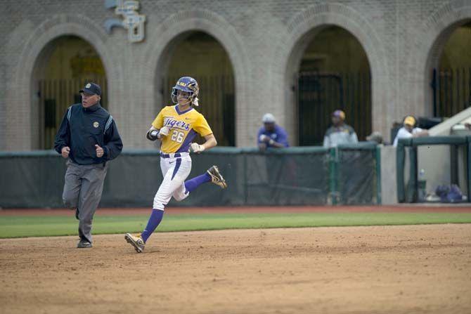 LSU sophomore outfielder Bailey Landry (26) rounds first base on Monday, April 20, 2015, during the Tigers' game against Texas A&amp;M at TIger Park.