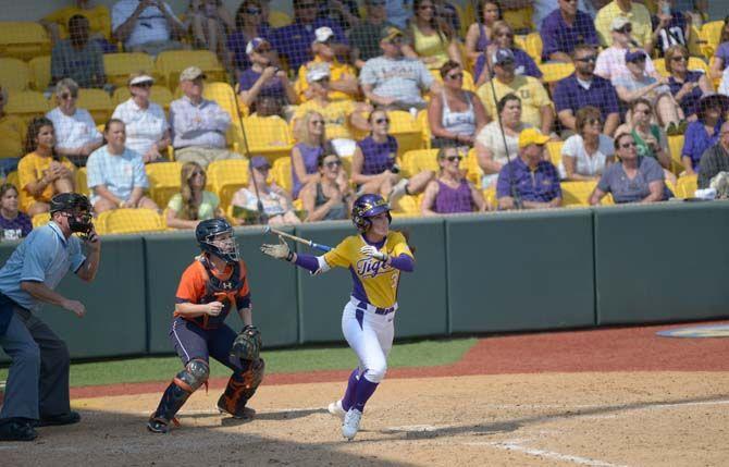 LSU junior infield Sandra Simmons (3) hits a home-run during the Tiger&#8217;s 7-1 victory against Auburn on Sunday, May 3, 2015 in Tiger Park.