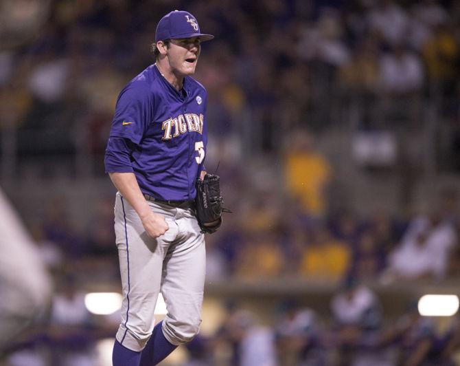 LSU freshman pitcher Alex Lange (35) celebrates after retiring the side to end the sixth inning during the Tiger's 2-0 victory against UNC Wilmington in the NCAA Regionals on Saturday, May 30, 2015 in Alex Box Stadium.