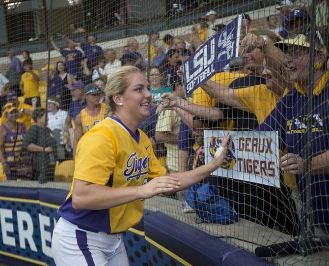 LSU freshman pitcher Carley Hoover (21) celebrates with fans the Tiger's 10-5 final victory against Arizona on Sunday, May 24, 2015 in Tiger Park.