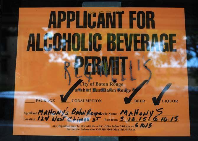 An alcoholic beverage permit filed by Mahony's Irish Pub is posted on the building formerly occupied by Reginelli's Pizzeria.